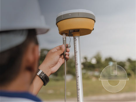 A surveyor sets up a Global Navigation Satellite System or GNSS Receiver. Real-time kinematic or RTK geodetic surveying equipment used in the field. Gradient overlay on top of image with engineering icon.