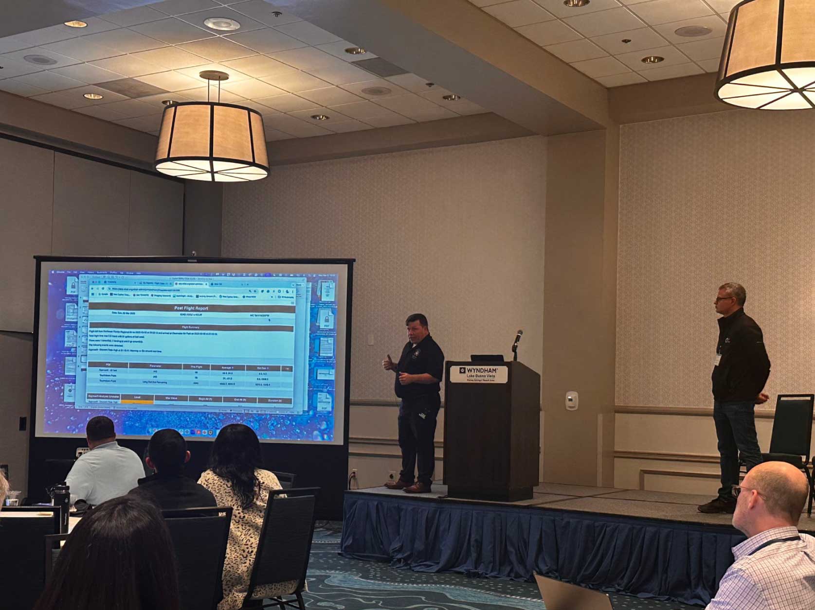 Jason Harris, Director of AirSync, and Kamron Githens with Cypher LLC, presenting at Fuzion Safety Conference.