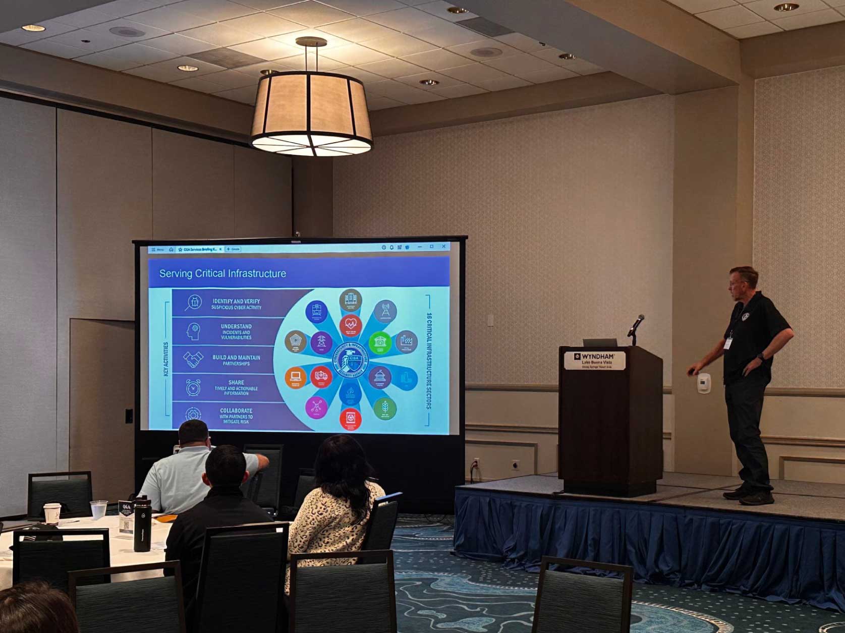 Kenneth Stacey, Supervisory Cybersecurity Advisor for the Cybersecurity and Infrastructure Security Agency (CISA) within the Department of Homeland Security (DHS), giving a presentation at the Fuzion Safety Conference.