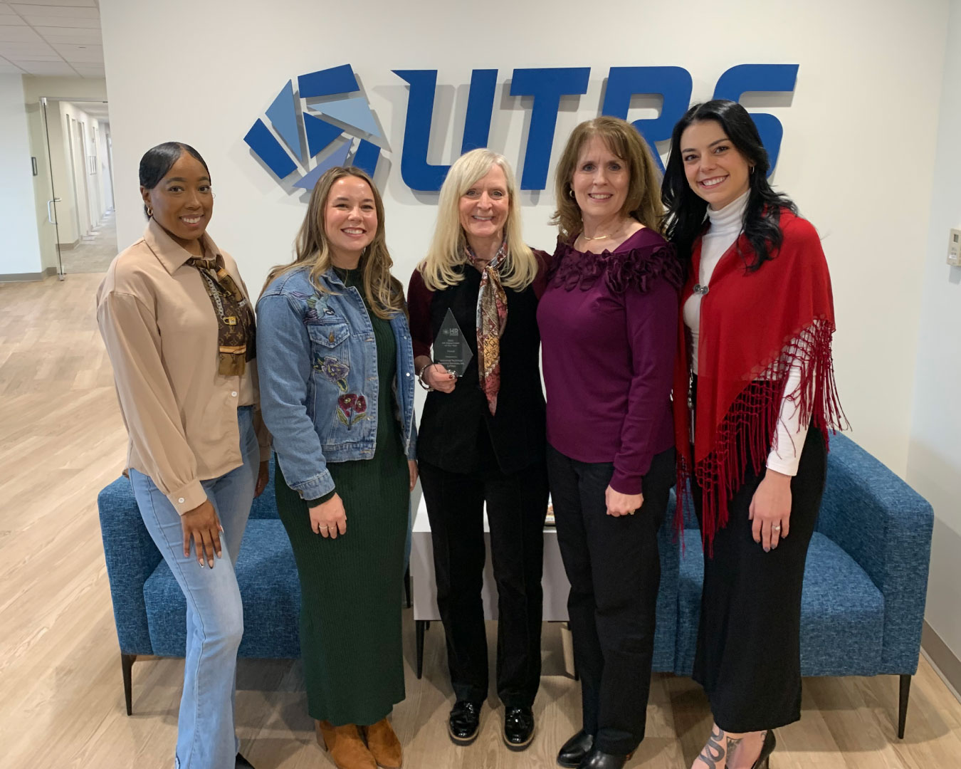 UTRS HR team with 2025 HR Department of the Year Award Finalist award.