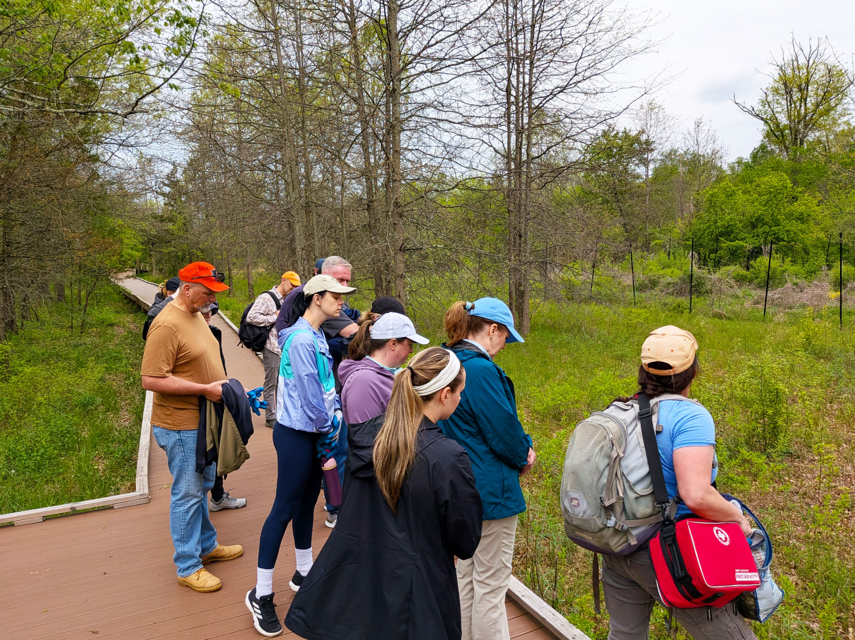 UTRS volunteers receiving orientation along the Watershed Institute’s Hickory Loop Boardwalk