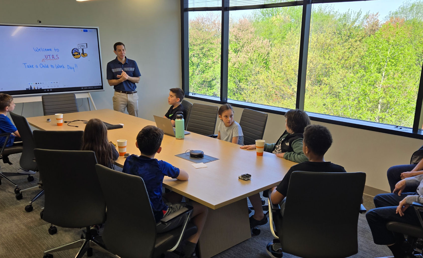 Take your child to work day in 2025. Took place at our new corporate headquarters in Marlton, NJ. UTRS COO talking to the children of UTRS employees.