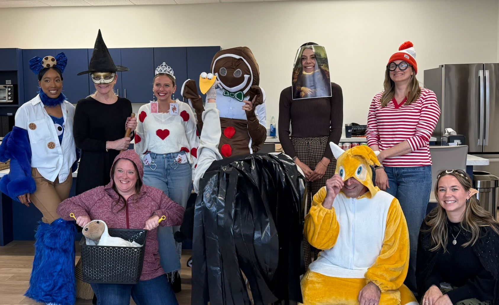 Group photo of UTRS employees in their costumes for the Corporate Halloween party in 2026