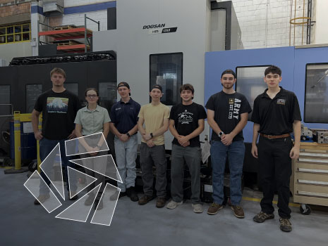 Group photo of current Universal Technical Resource Services, Inc. (UTRS) interns at facility at Picatinny Arsenal.